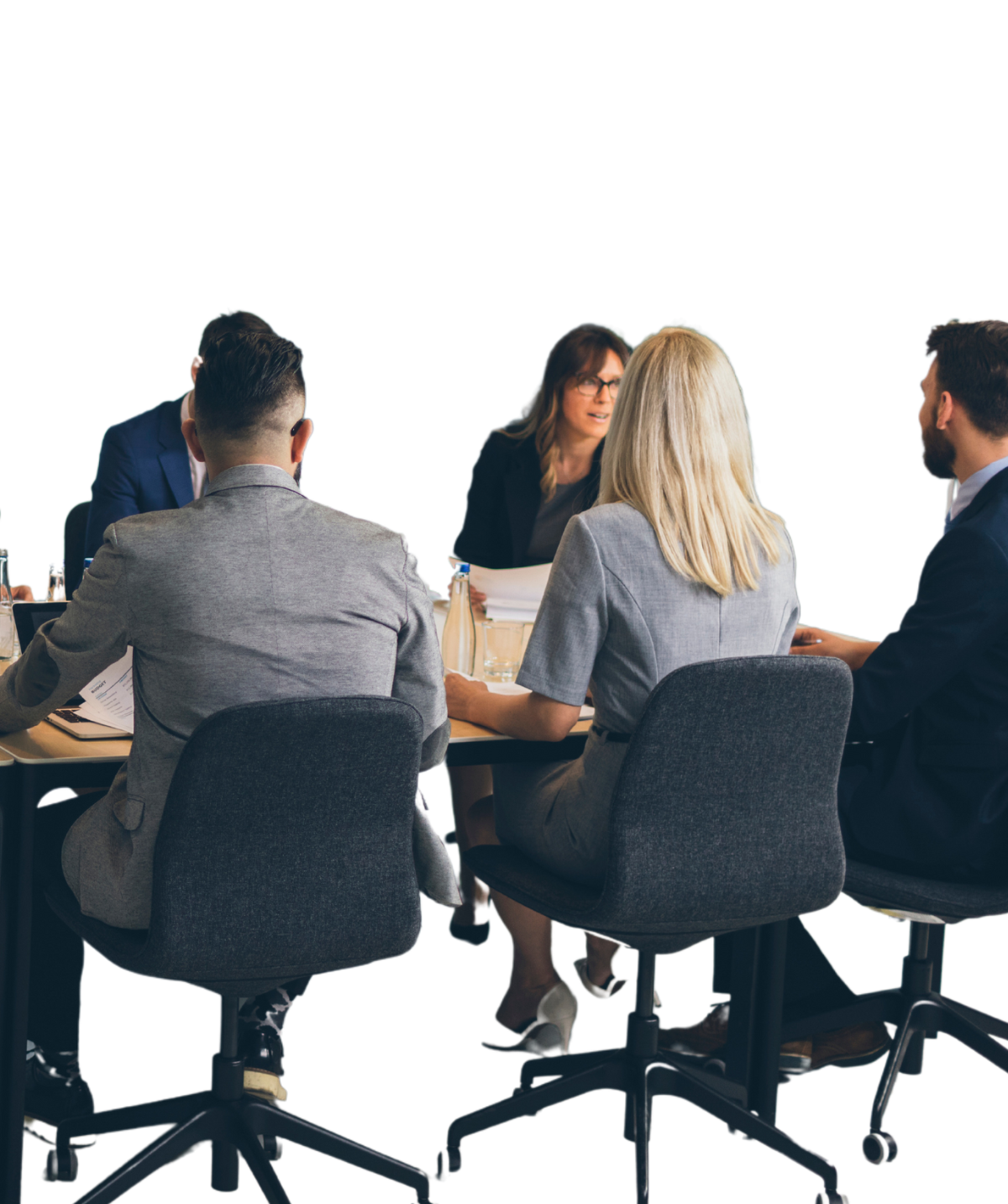 Small-business team meeting around a conference table to review IT and technology decisions — Umbrella IT Group